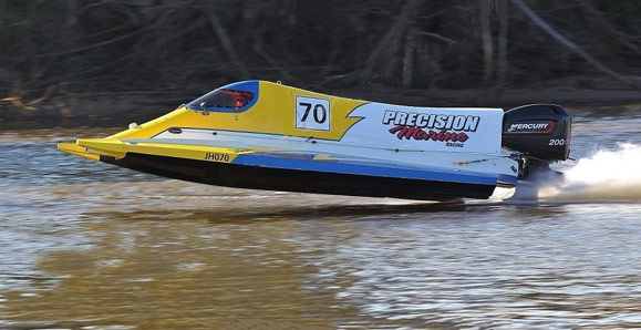 Jason driving "PRECISION MARINE RACING" tunnel boat with different colours.